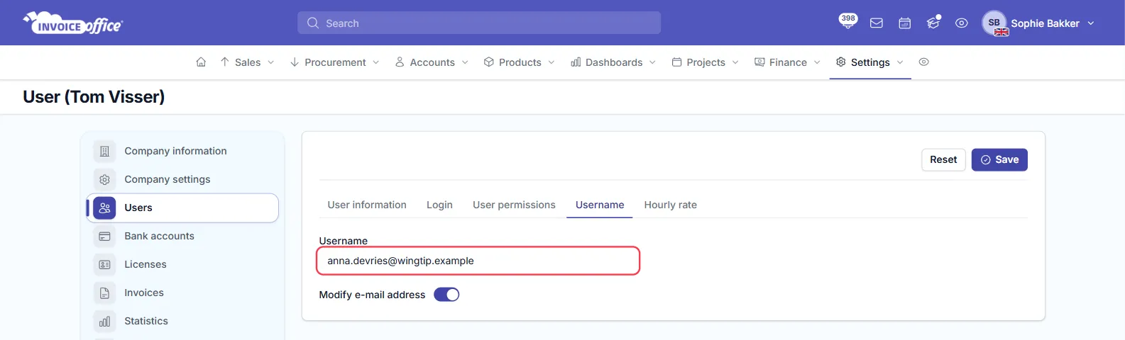 The Username tab of the user form for Tom Visser in Invoice Office, with the new address anna.devries@wingtip.example in the Username field, outlined in red, and the Modify e-mail address switch turned on
