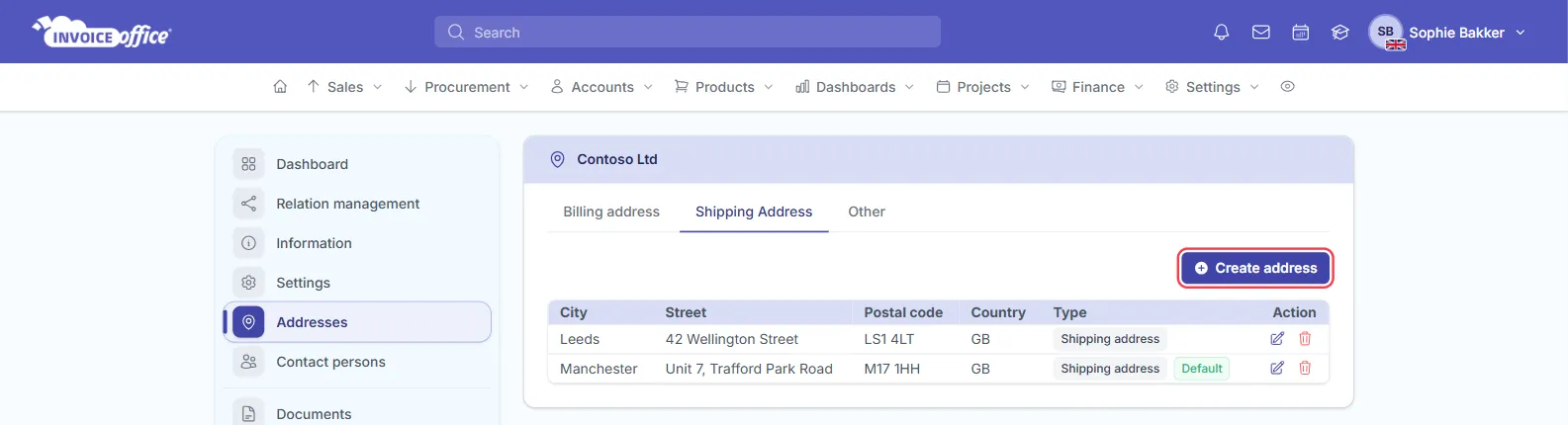 The Shipping Address tab for Contoso Ltd listing two addresses, 42 Wellington Street in Leeds and Unit 7, Trafford Park Road in Manchester, both with the Shipping address type and the Manchester one marked Default; the Create address button is outlined in red
